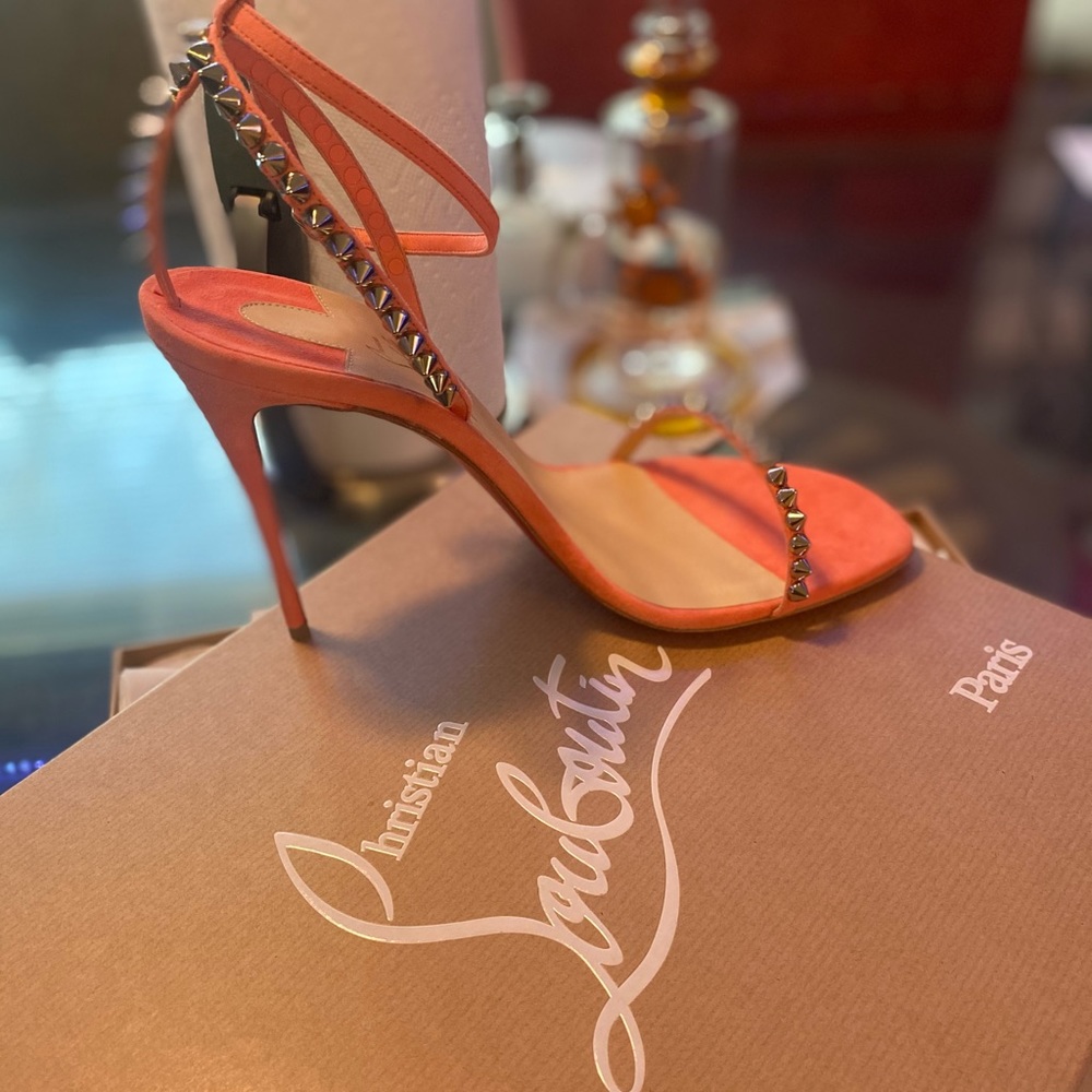Peach colored summertime Studded Christian Louboutin‘s